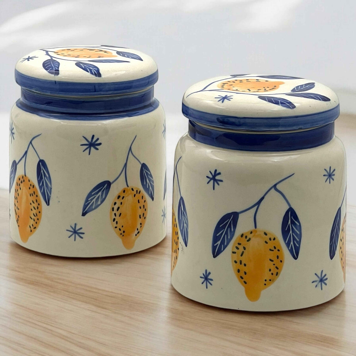 Hand-painted ceramic kitchen storage jars with lemon design